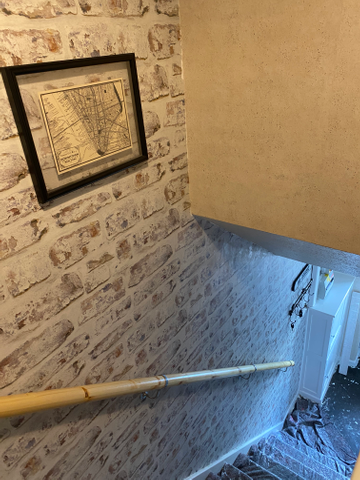 Showing wallpaper Arthouse VIP White Washed Brick Wallpaper - 671100 on the wall