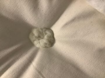 A customer photo for Hypnos Wool Origins 6 Mattress - A bad first impression I found a piece of wood stuck in one of the rosettes and . Author: Susan. Dated: 2023-07-30