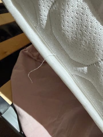 A customer photo for Silentnight Double Sided Miracoil Mattress - Very hard bed and cotton hanging delivery was really bad as they couldnt hardly . Author: Customer. Dated: 2026-02-06